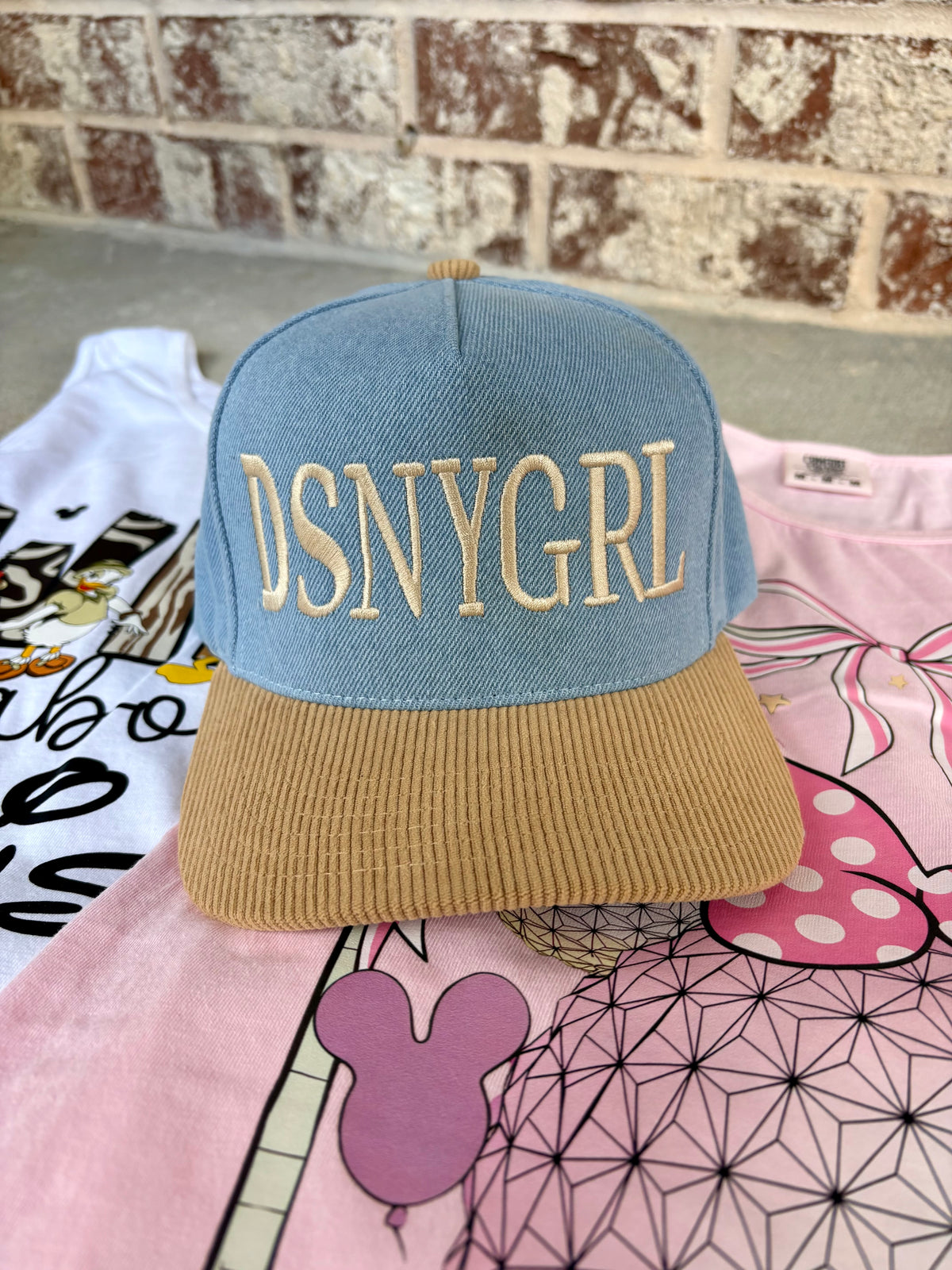 “DSNYGRL embroidered snap back trucker hat”