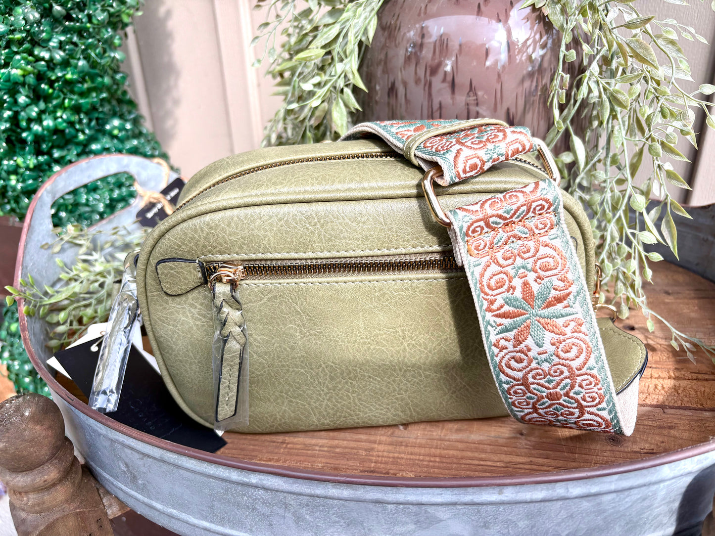 “Olive crossbody with adjustable guitar strap”