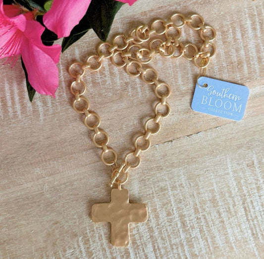 “Gilded Grace Cross Statement Necklace”