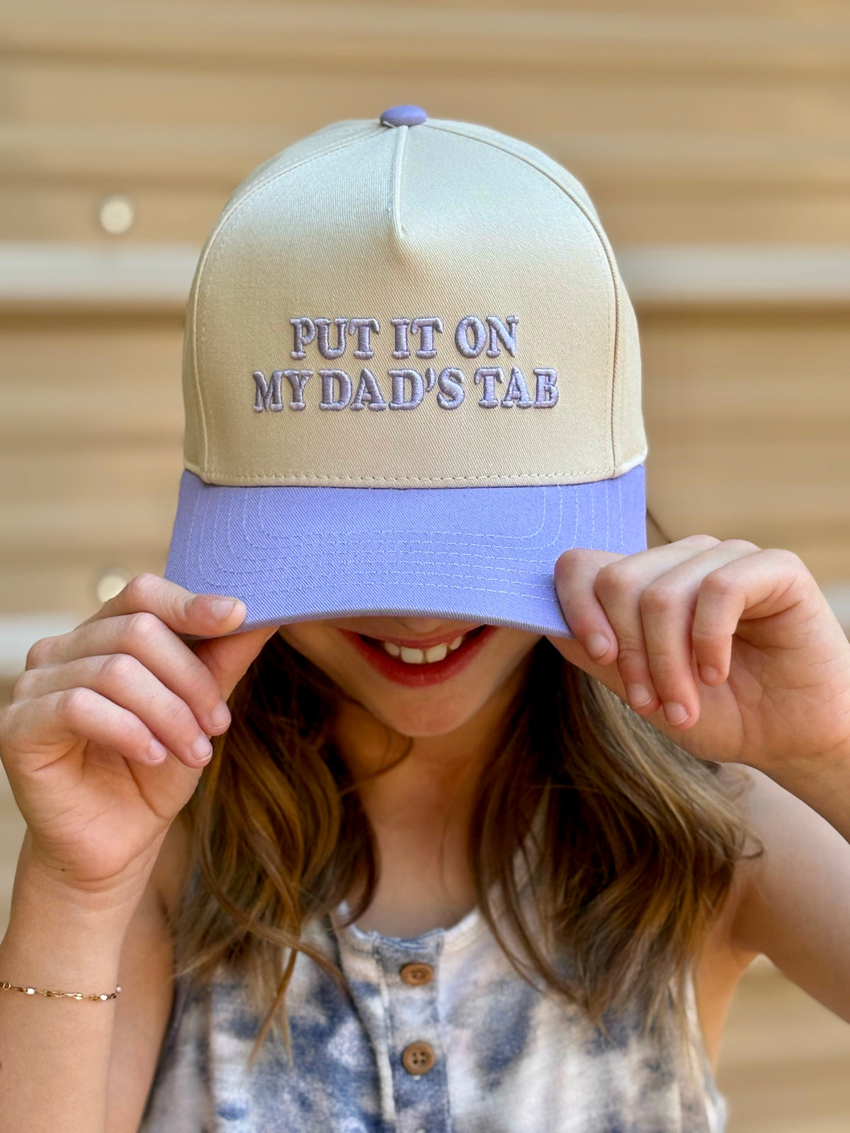 “Put It On My Dad’s Tab Youth Adjustable Trucker Hat”