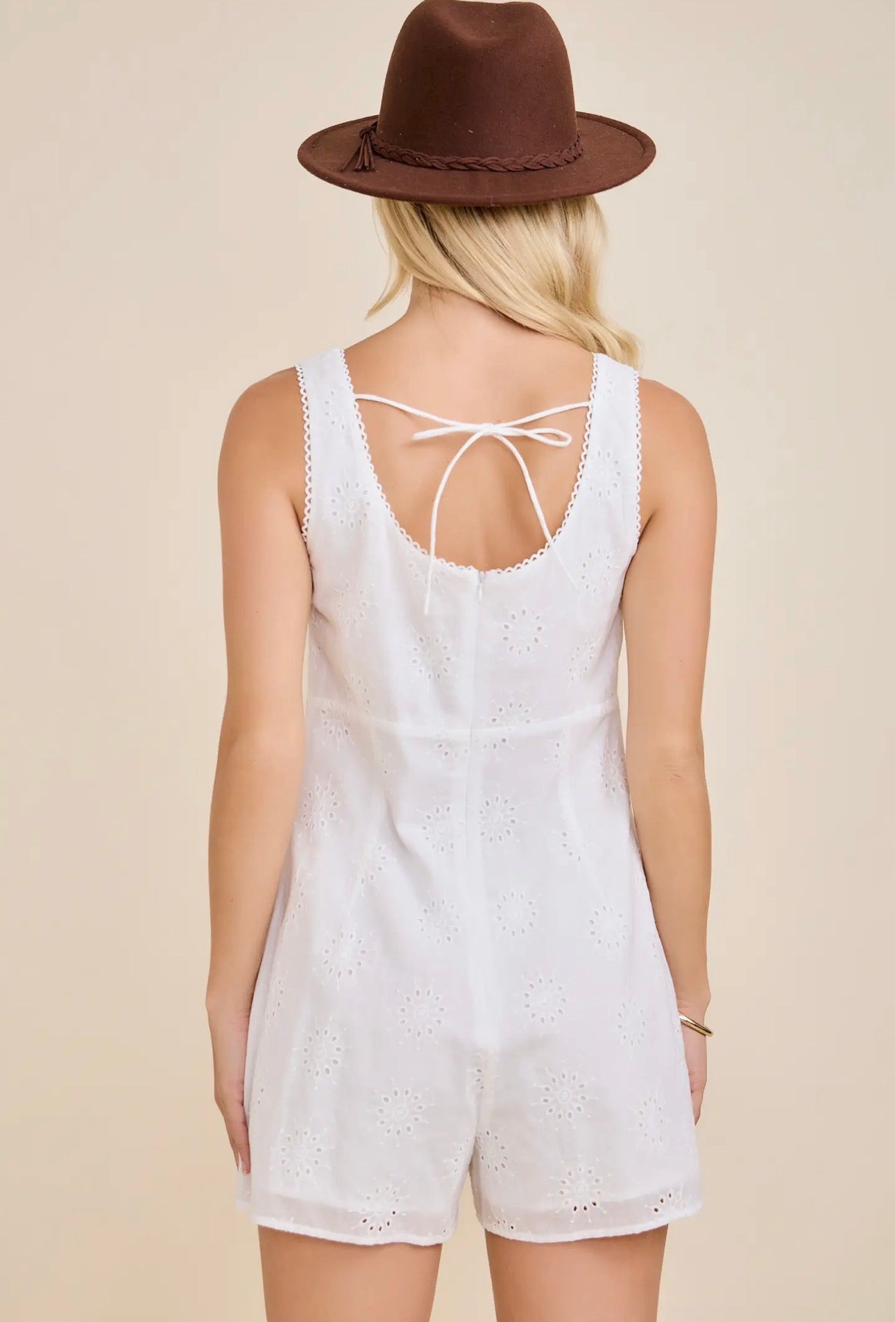 “Eyelet Embroidered Lace Up Romper”