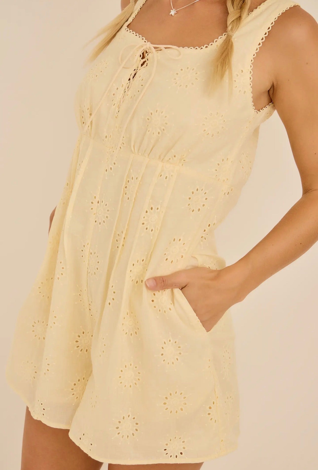 “Eyelet Embroidered Lace Up Romper”