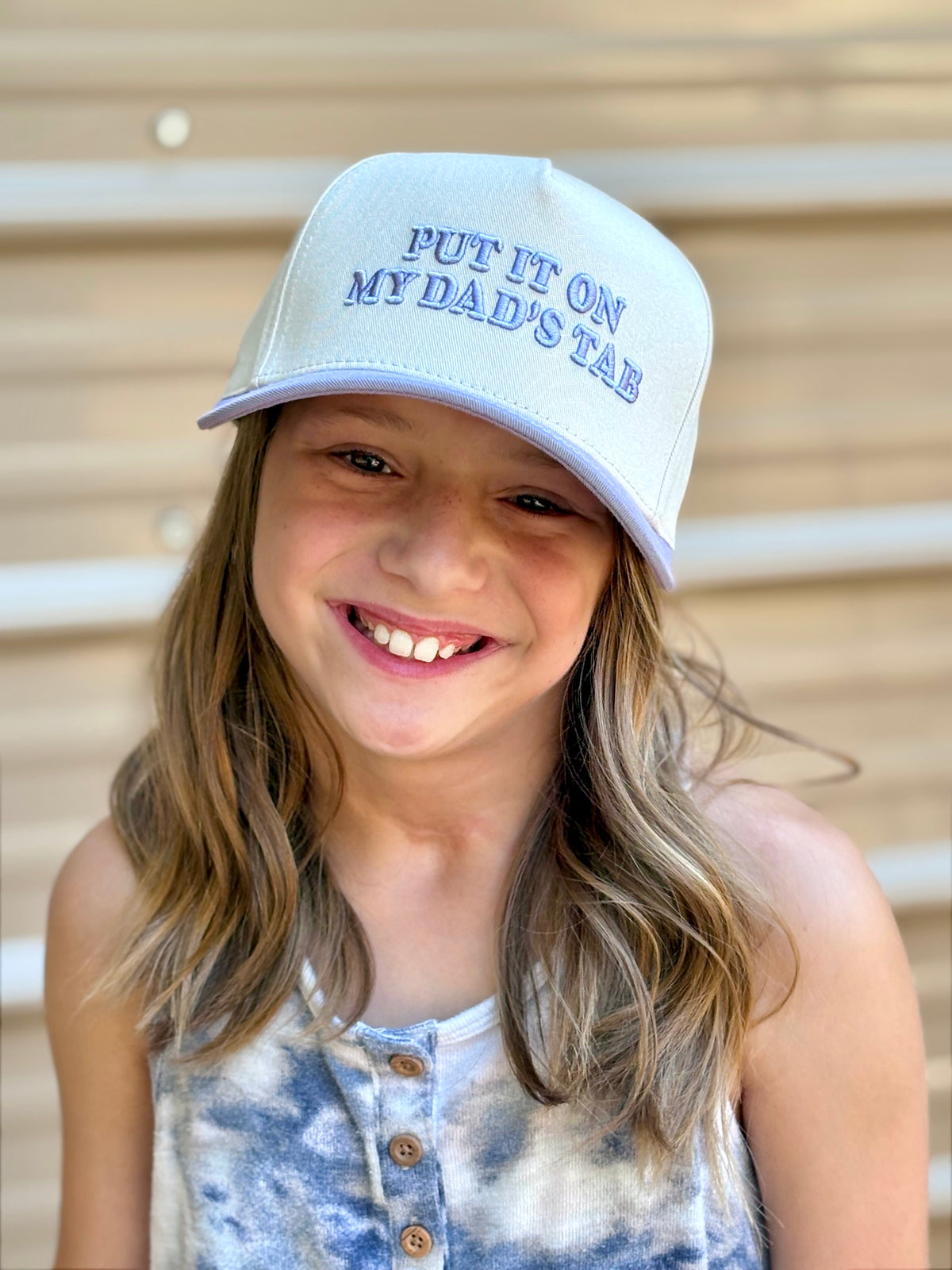 “Put It On My Dad’s Tab Youth Adjustable Trucker Hat”